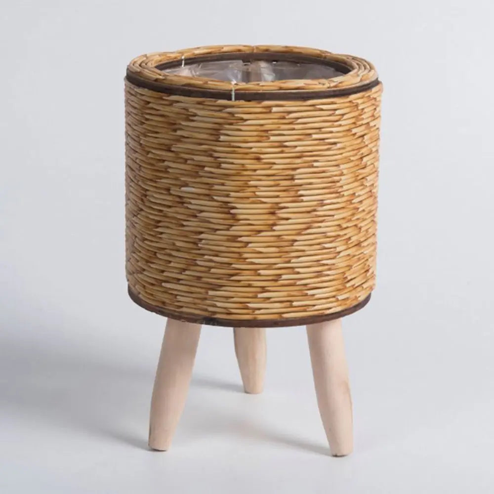cache pot tressé rotin moderne cactus feuilles vertes marron clair pieds bois durable tissé