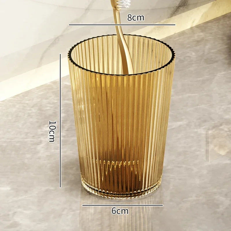 verres dents moderne transparents rayures verticales adhésifs élégants verte dorée grise brosse tube
