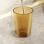 verres dents moderne transparents rayures verticales adhésifs élégants verte dorée grise brosse tube