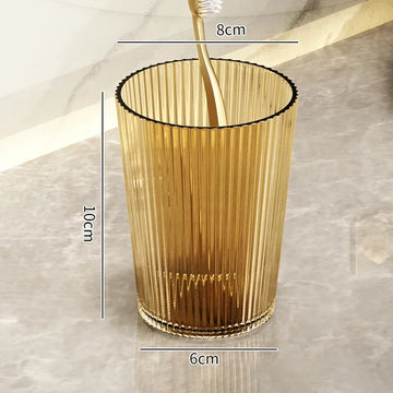 verres dents moderne transparents rayures verticales adhésifs élégants verte dorée grise brosse tube