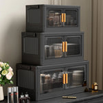 rangement modulaire meuble noir panneaux transparents poignées dorées roulettes facile assembler chambre salon cuisine