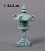 décoration table zen pierre miniature lanterne japonaise arbre branches mousse rocher gris vert traditionnelle