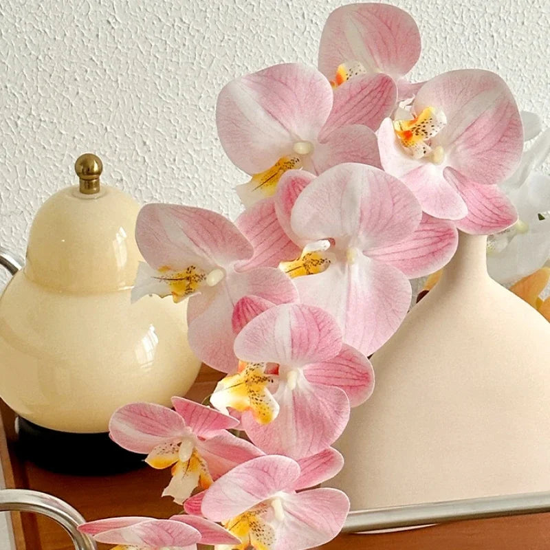 décoration intérieure vase orchidées artificielles fleurs douces feuilles vertes moderne élégant rose blanc violet