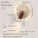 lampe murale moderne pierre jaune texture bois naturel peach beige interrupteur câble minimaliste