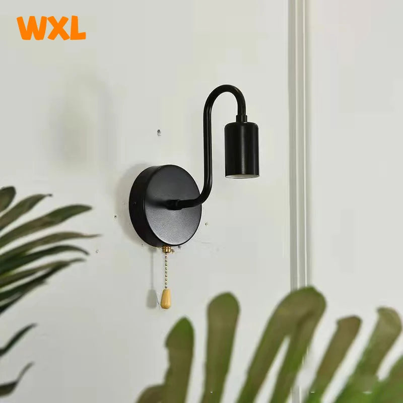 lampe murale moderne fer noir fixe 15cm largeur 18cm hauteur interrupteur ampoule