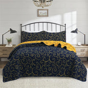 ensemble couette bleu foncé motif étoiles spirales dorées quiltée taies d'oreiller chambre coucher intérieur