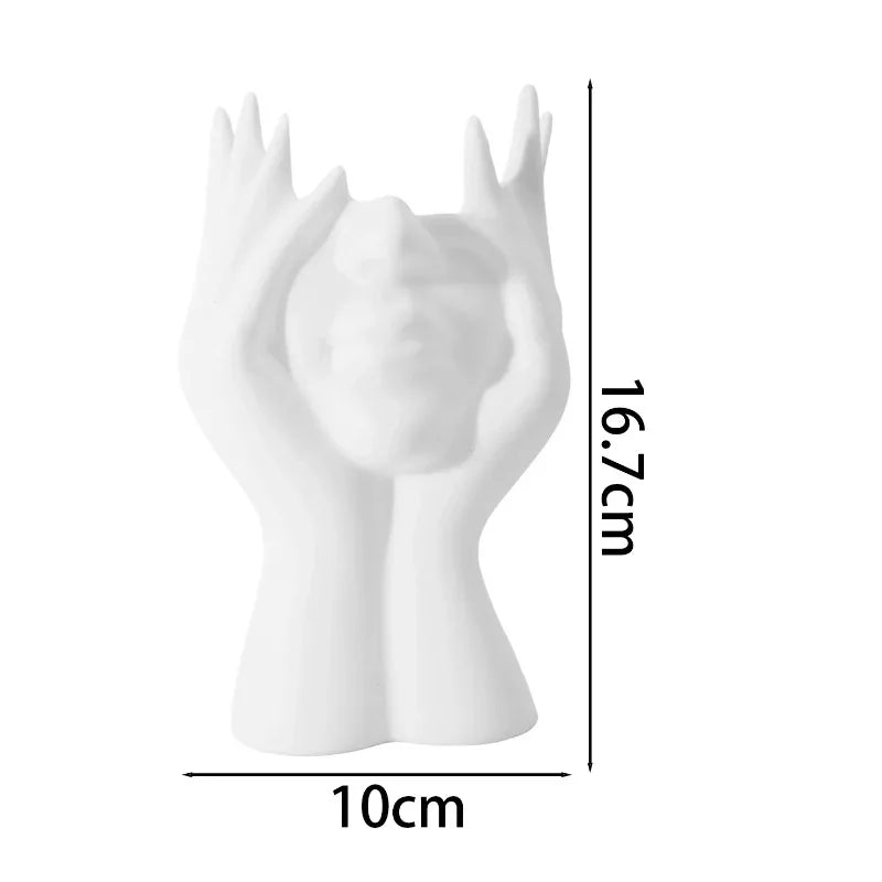 support pinceaux maquillage or argent noir visage stylisé moderne sculpturaliaux pinceaux