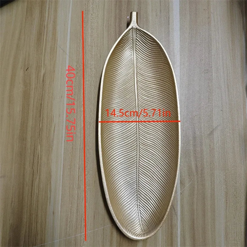 assiette moderne imprimée feuille dorée plateforme bijoux accessoire décoration maison élégante texture naturelle opacité