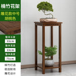 meuble plante moderne gravure traditionnelle marron foncé vases sculpturales or doré