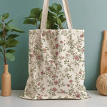 sac main fleurs roses feuilles vertes fond beige vintage romantique poignées détachables femme