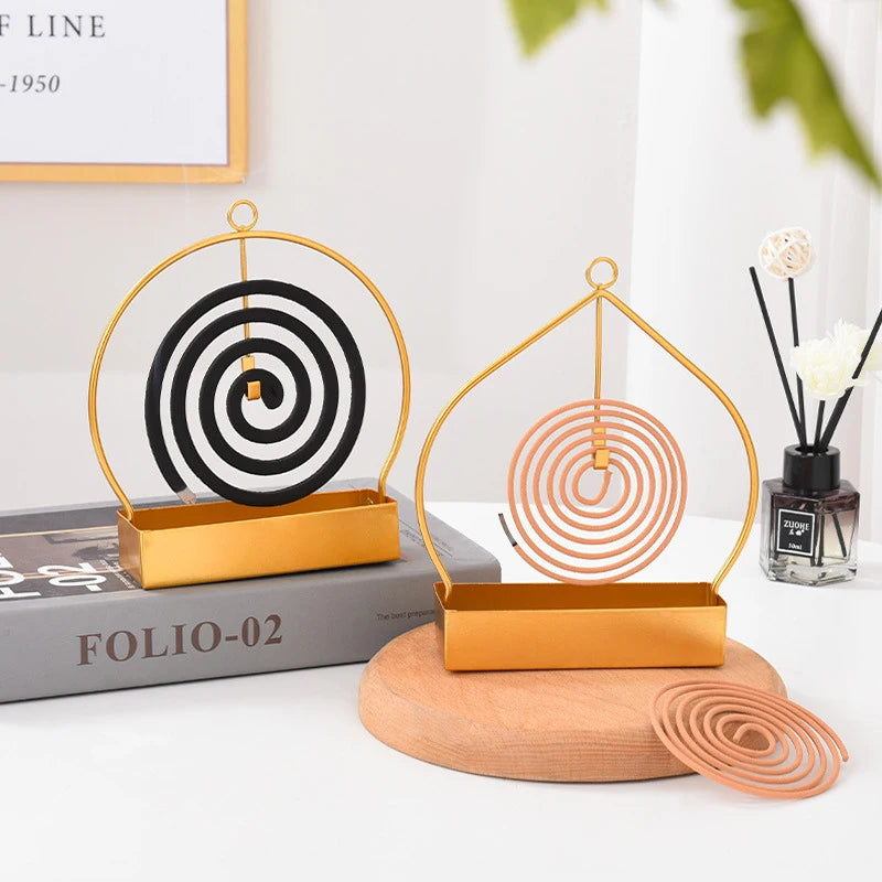 support moderne spirale insecticide or noir bois clair suspension huile essentielle diffuseur minimaliste deco