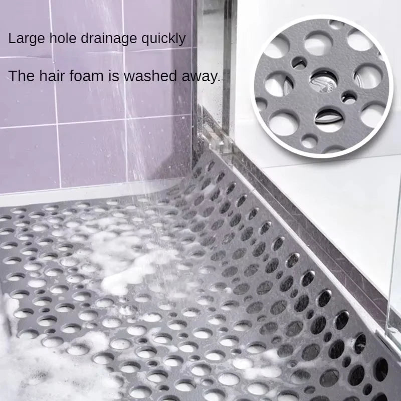 tapis bain antidérapant gris moderne perforations circulaires salle bain respectueux environnement