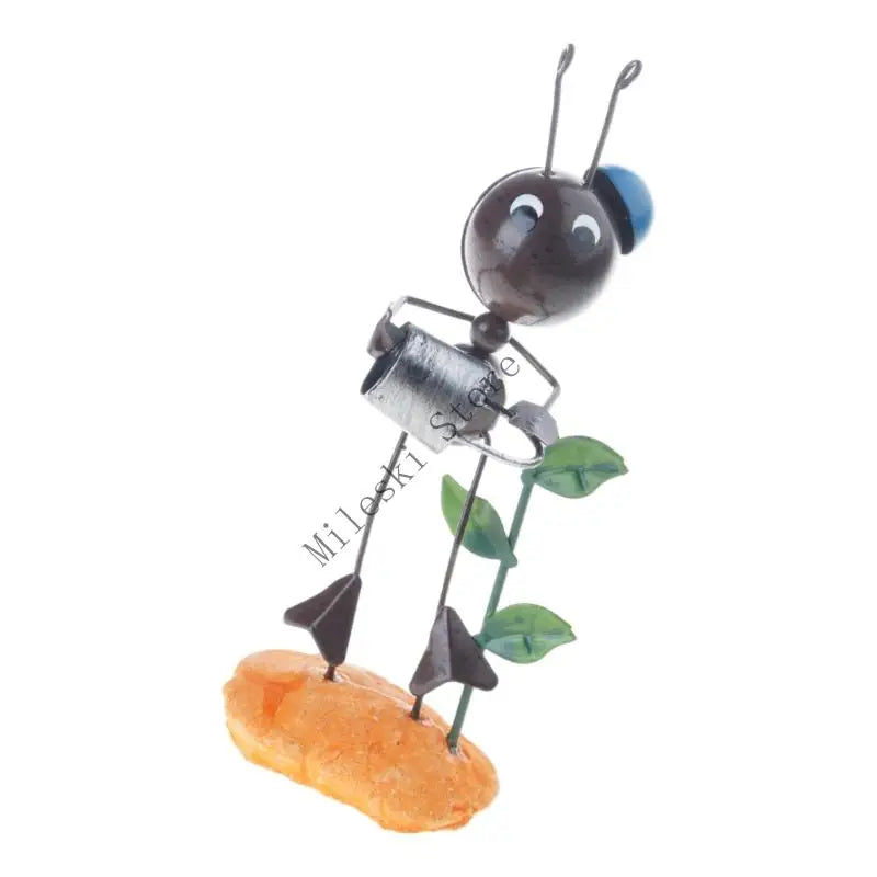 figurine métallique jardin feuilles fleurs décor extérieur moderne artisanal noir bleu vert orange blanc