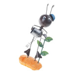 figurine métallique jardin feuilles fleurs décor extérieur moderne artisanal noir bleu vert orange blanc