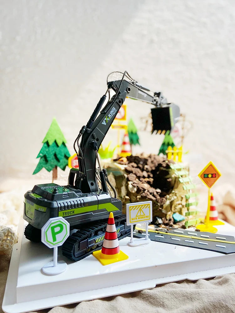 miniature excavatrice noir truck imprimé parties mobiles terrain graviers arbres signalisation sécurité