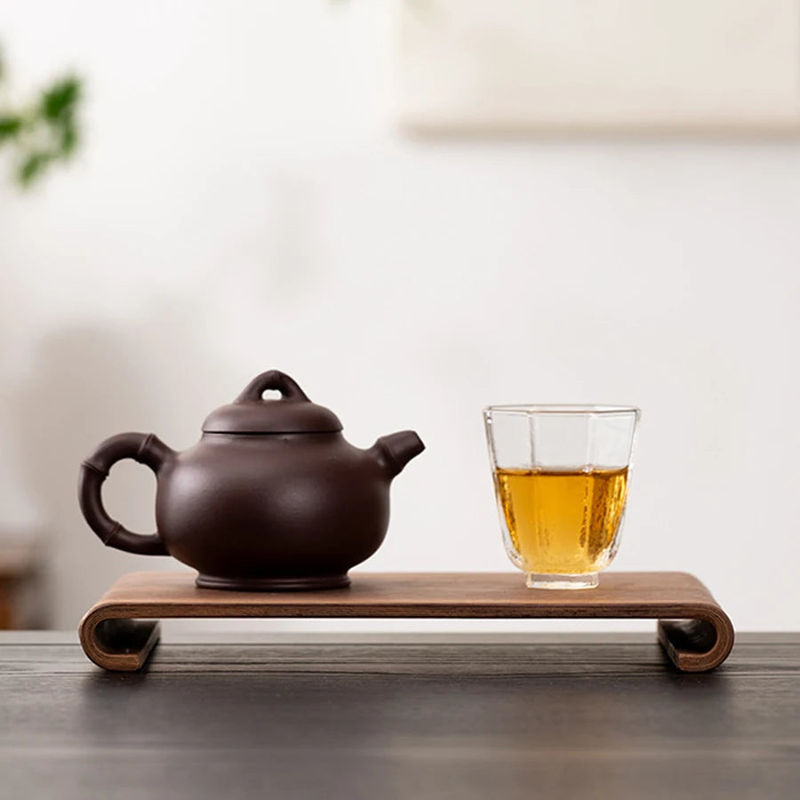 support thé bois minimaliste marron foncé grain naturel résistant chaleur théière tasse thé cuillère