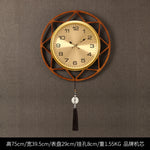 horloge murale or noir motif géométrique tissu classique tassel moderne