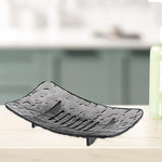 support savon noir texture rugueuse moderne antidérapant durable économie savon salle bain famille voyage