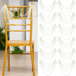 décorations mariage guirlandes satin blanc nacré or chaises allée festive élégantes classicampoises salopes
