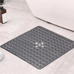 tapis bain antidérapant gris moderne perforations taches blanches opacité suction lavable machine