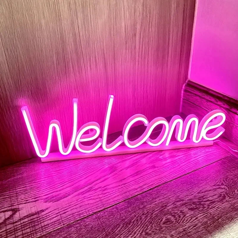 enseigne lumineuse welcome néon blanc rose bleu lettres stylisées boîte charge usb cable charge