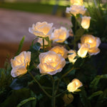 décoration extérieure moderne bouquet lumineux roses artificielles rouge rose jaune bleu blanc patio jardin