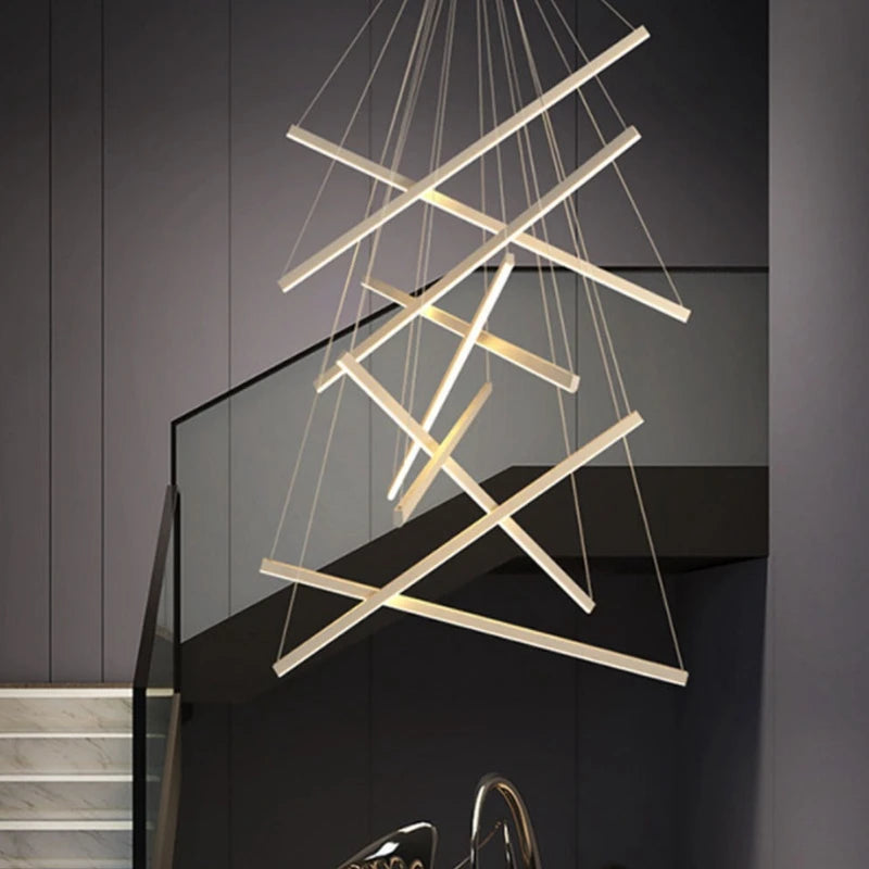 suspension lumineuse moderne dorée noir lignes géométriques lumières chambre salon