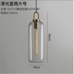 suspension lumineuse moderne gris fumé doré verre mat métal poli ampoule filament visible chambre