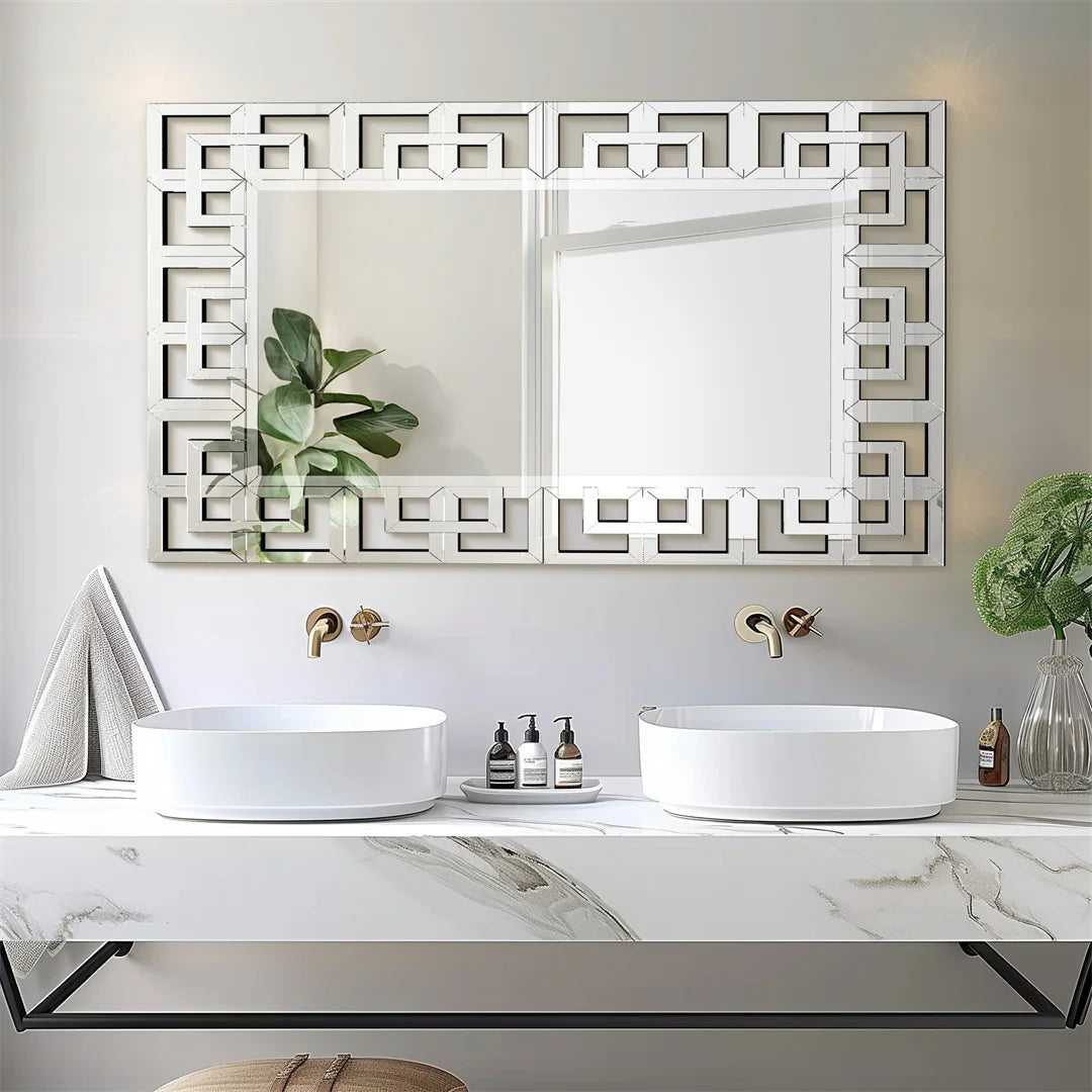 Élégante salle de bain moderne avec miroir décoratif et évier double au design épuré.