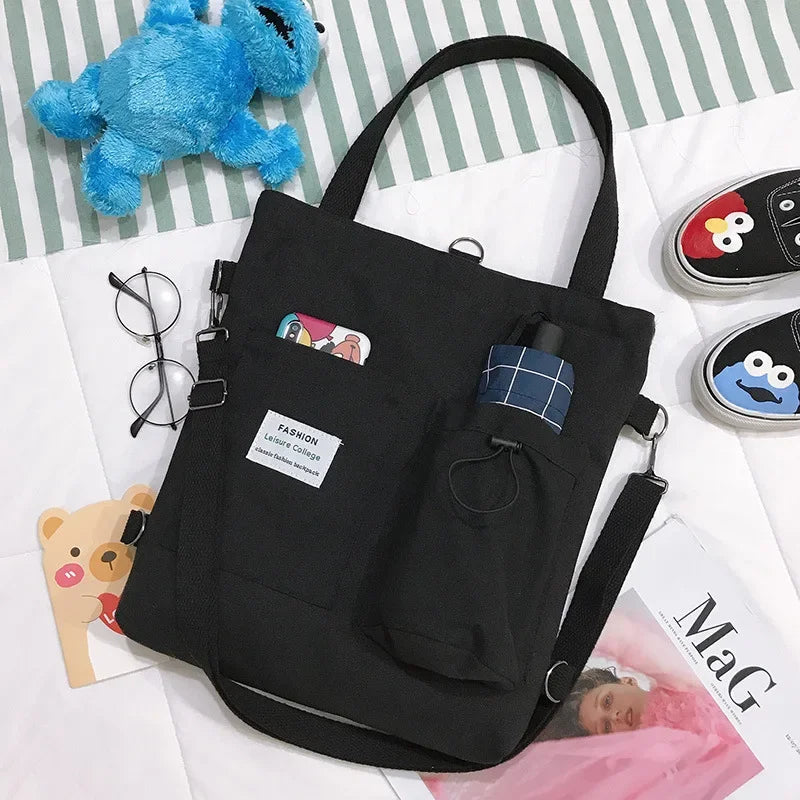 sac main uni jaune blanc vert noir moderne poignées détachables porte clés poche avant