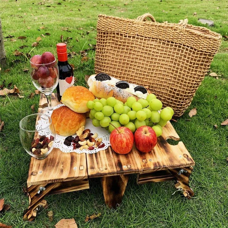 table pliante rustique panier osier boîte bois fruits légumes vin rouge verres transparents dentelle