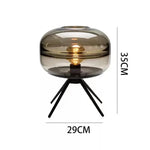 lampe sol moderne transparente ampoule filament noir gris fumé led verre minimaliste