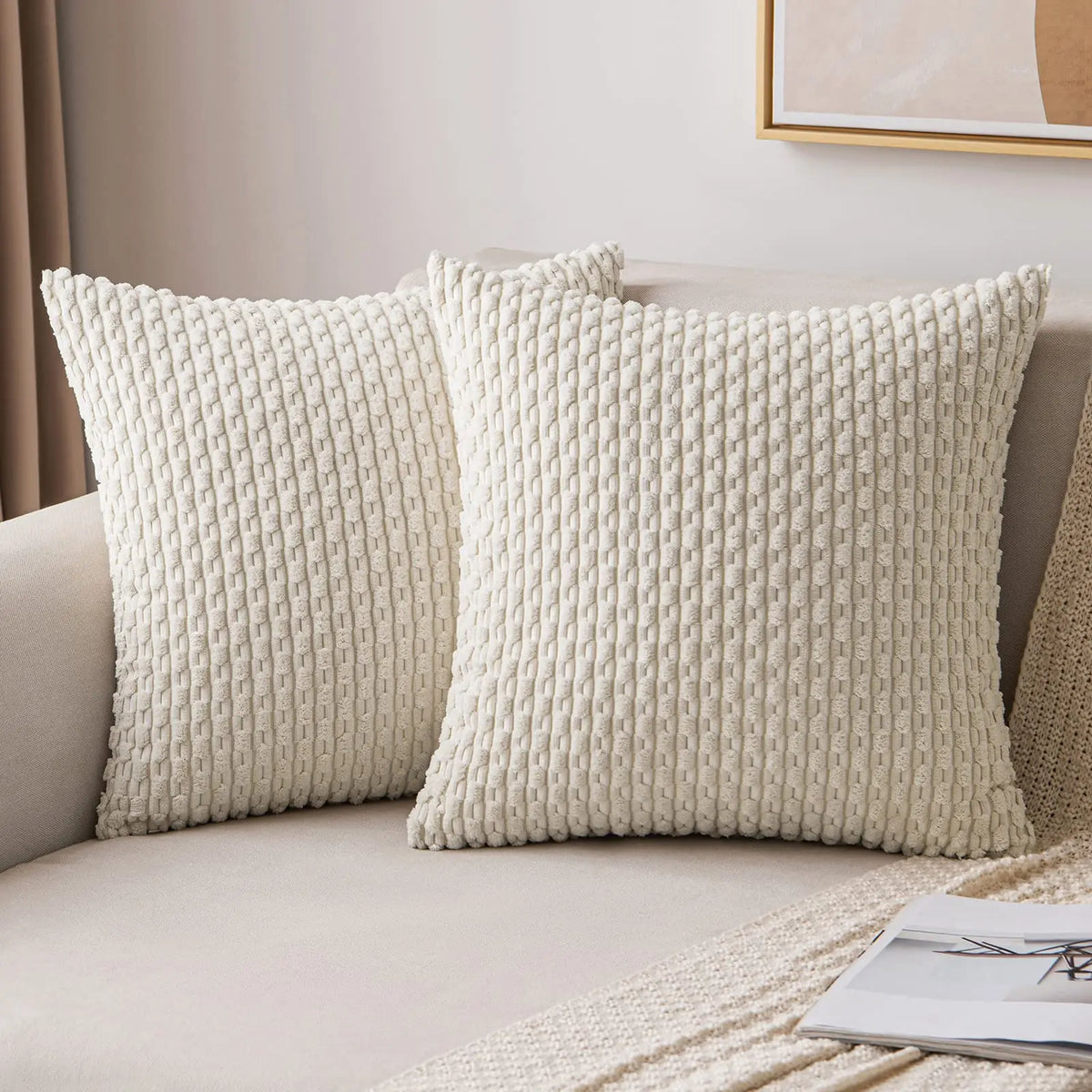 coussins carrés vert clair beige rose pâle texture tissée pompons moderne fermeture glissière