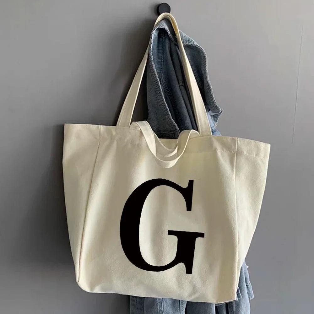 sac main femme toile beige clair lettre noire poignées détachables