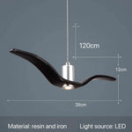 suspension lumineuse moderne oiseau stylisé blanc noir éclairage salon chambre led résine intérieur