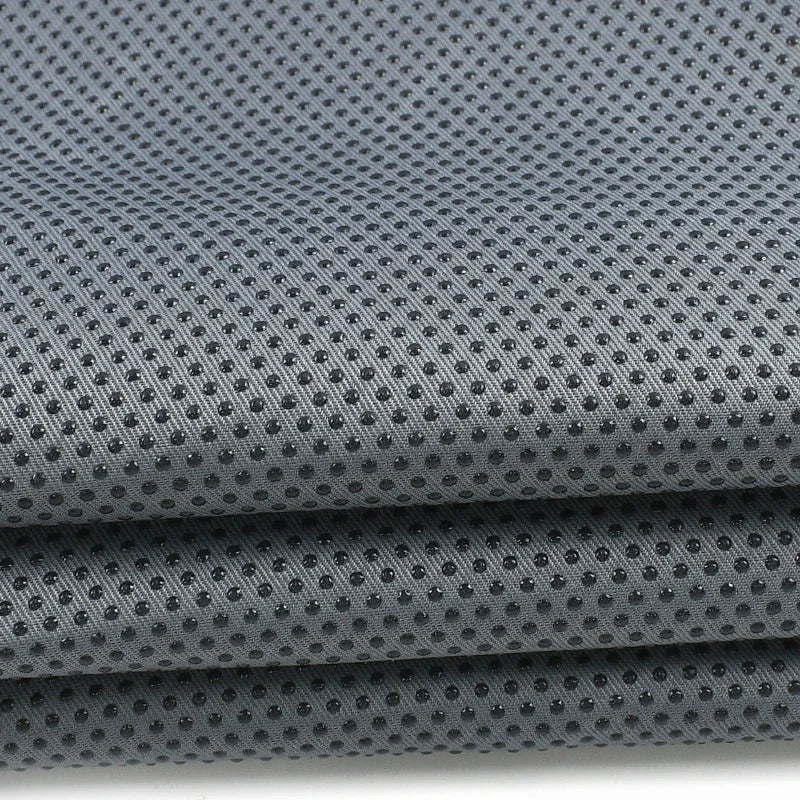 tissu antidérapant polyester acrylique blanc noir bleu gris moderne perforations 150cm non slip