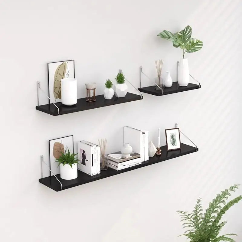 étagères murales noires modernes chambre salon rangement livres plantes cadres vases diffuseurs huiles essentielles