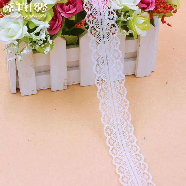 ruban dentelle 30mm violet rose orange bleu noir blanc motifs floraux classique polyester