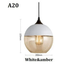 suspension lumineuse moderne pendentif verre noir transparent contemporain fixation câble luminaire salle manger chambre