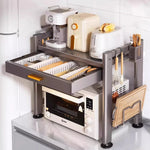 rangement cuisine tiroirs acier inoxydable gris noir moderne batteur cuillères couteaux toaster friteuse