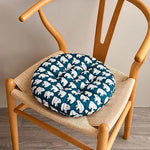 coussin chaise rond moderne couleurs bleu marine blanc vert beige noir motifs géométriques feuilles