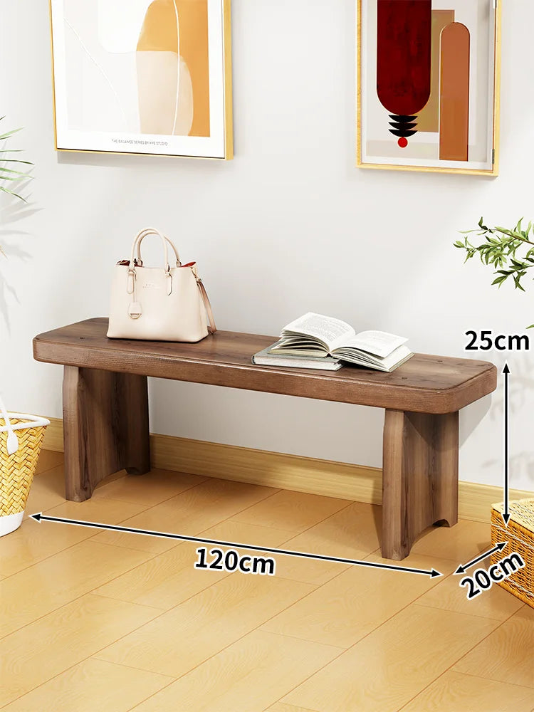 Banc bois marron clair texture naturelle moderne salon tabouret sac main livre ouvert decoration