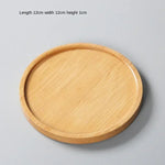 assiettes support plats bambou moderne minimaliste naturel bois clair grain bois respectueux environnement stockage