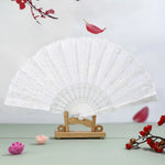 éventail traditionnel rouge noir fleurs blanches clips pompon danse mariage pliant décoratif