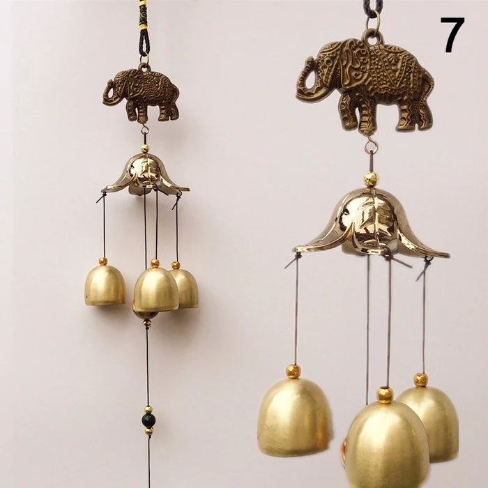 cloches décoratives dorées motifs oiseaux éléphants poissons yin yang feng shui suspension traditionnels