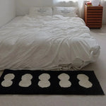 tapis imperméable anti dérapant moderne blanc noir cercles superposés chambre couloir entrée