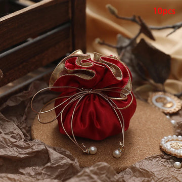 sac cadeau violet satiné ruban doré blanche élégant anniversaire bijoux cadeau opulent 10 pièces