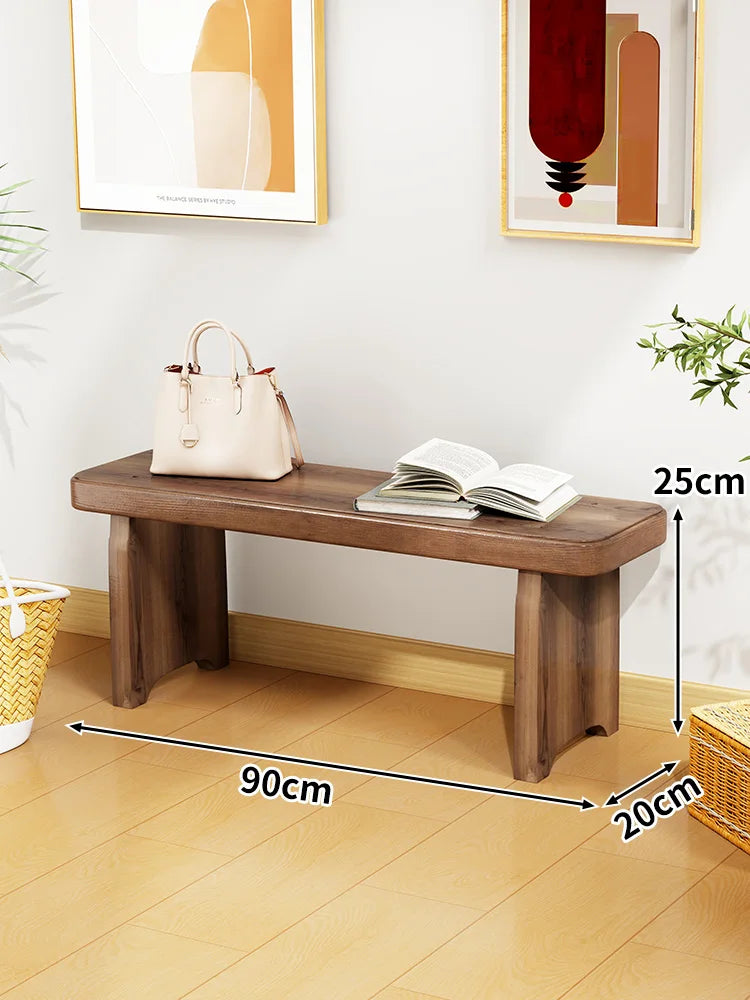 Banc bois marron clair texture naturelle moderne salon tabouret sac main livre ouvert decoration
