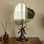 miroir table décoratif or noir rose poudré vert rubans modernes élégants fixé pied métal