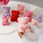 bougies parfumées forme nounours parfum rose couleur violet rouge blanc aromathérapie